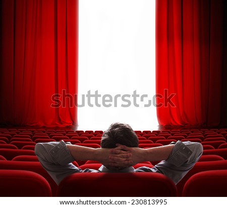 cinema screen red curtains opening for one vip person