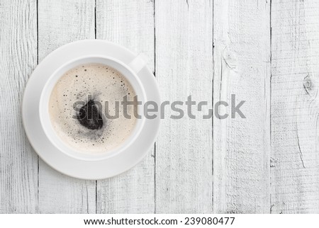 coffee cup top view on white wood table background