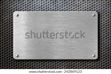 brushed steel metal plate background with rivets