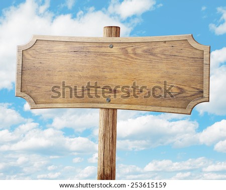 wood road sign on sky background