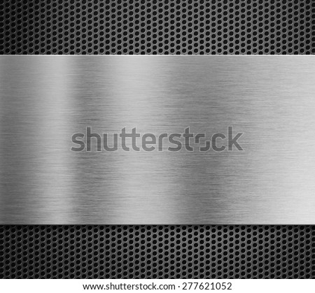 aluminum metal plate over grill background