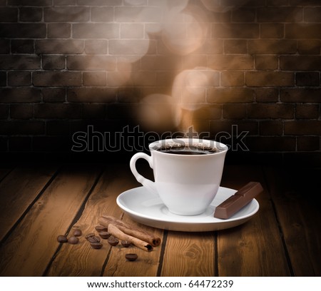 Black hot coffee cup with chocolate and cinnamon