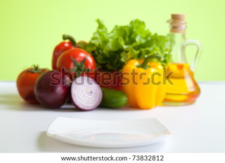 healthy food fresh vegetables still life and focused white plate in front
