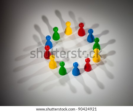 group of multi-colored people to represent social network, diversity, multi-cultural society, team work togetherness