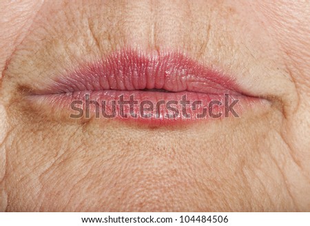 wrinkled woman skin with lips