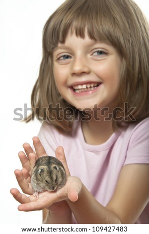 Child Holding Hamster