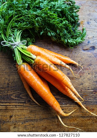 Carrots On A Wooden Background