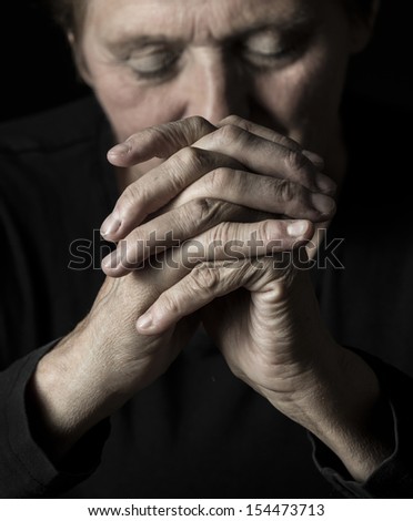 old praying woman