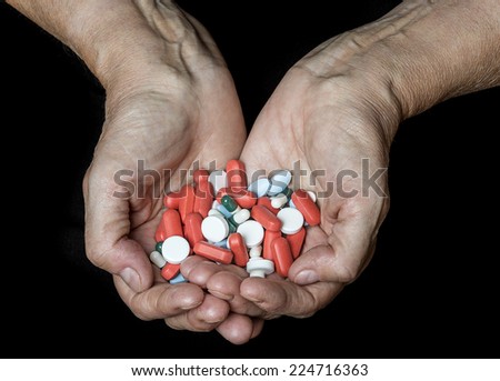 old hands with pills
