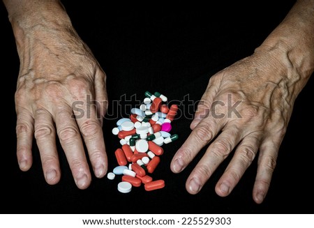 old hands with pills