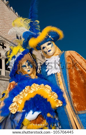 VENICE, ITALY - FEBRUARY 16: Unidentified people in Venetian masks at St. Mark\'s Square, Carnival of Venice on February 16, 2012. The annual carnival is from February 11 to February 21, 2012.