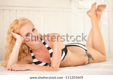 Attractive young bikini girl in bikini swimwear