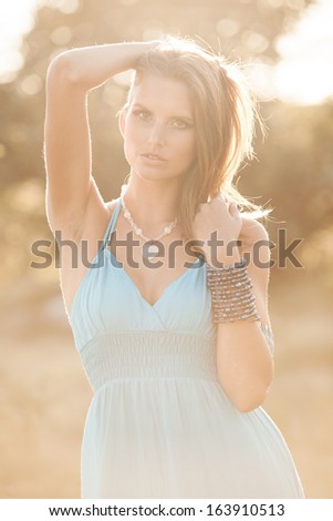 Beauty outdoor portrait of attractive young woman