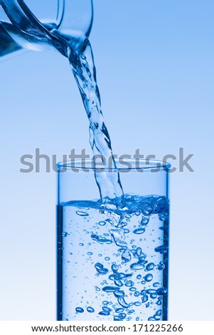 Fresh water - filling a glass with liquid
