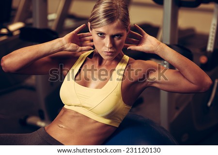 beautiful athletic woman working ab intervals