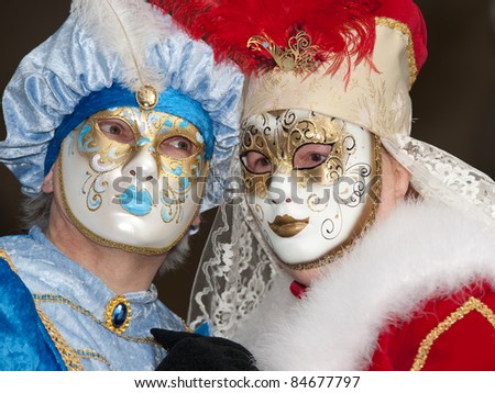 VENICE, ITALY - MARCH 7: Unidentified people in Venetian masks at St. Mark\'s Square, Carnival of Venice on March 7, 2011. The annual carnival is from February 26 to March 8, 2011.