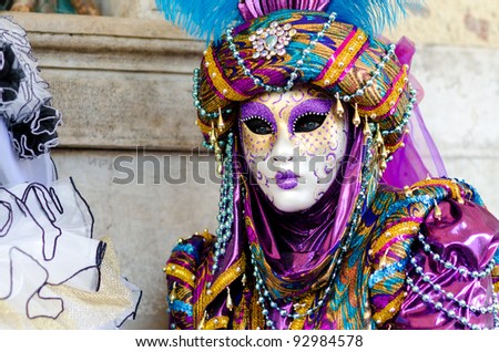 VENICE, ITALY - MARCH 7: Unidentified person in Venetian mask at St. Mark\'s Square, Carnival of Venice on March 7, 2011 in Venice, Italy. The annual carnival is from February 26 to March 8, 2011.
