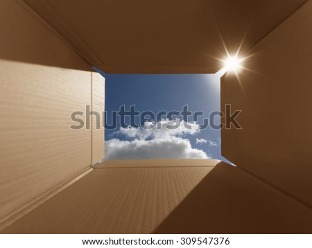 Conceptual shot illustrating the phrase 'thinking outside the box'. Implies inspirational thoughts, bright new ideas, imagination and escaping from the norm.