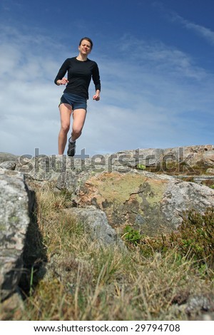 Running girl in shorts outdoor
