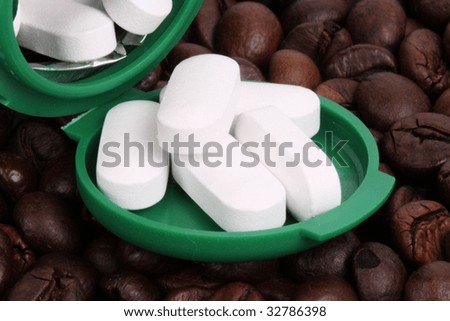 Coffee beans with white pills (addiction)