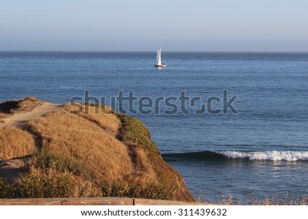 Sailboat on the ocean off the coast of Carmel, CA.