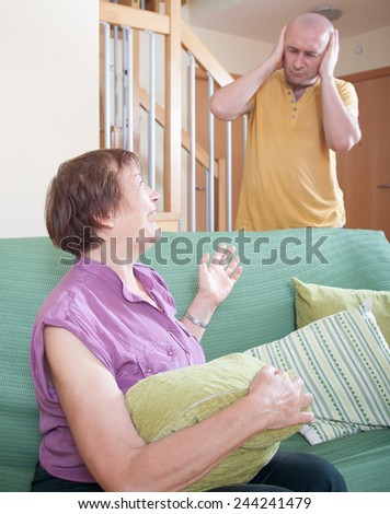 quarrel between an elderly mother and adult son.