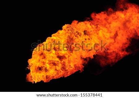 Fire from an oil refinery.