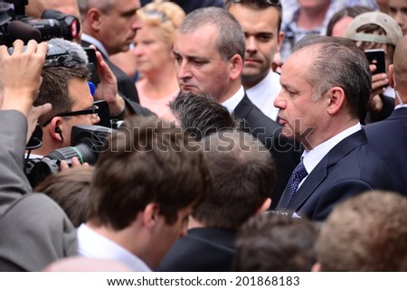 President Andrej Kiska surrounded by reporters during the presidential inauguration on June 15, 2014 in Bratislava, Slovakia.