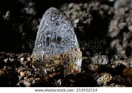 Thawing ice stalagmite inside an abandoned mine in Banska Stiavnica, Slovakia.