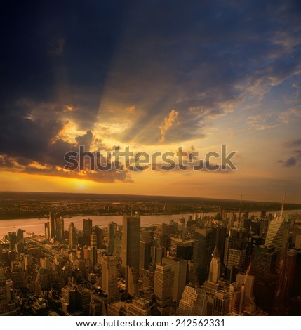 Aerial view of New York City from the Empire State Building at sunset.