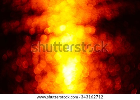 Golden abstract background pattern from lighting reflex main road at night after rain:Unfocused:ideal use for background.