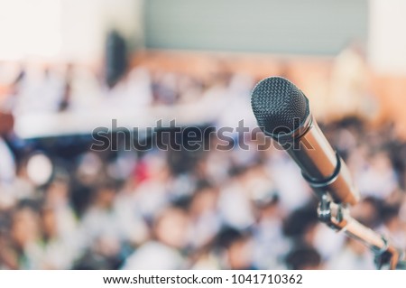 Blurred and Soft focus of head microphone on stage of Education meeting or event whit blurred background,Education meeting and event on stage concept and copy space