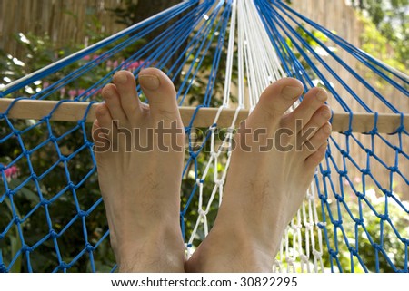 Hammock and feet, resting on the sun