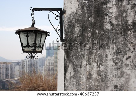 Lantern and skyscrapers - a contrast of old and new ages
