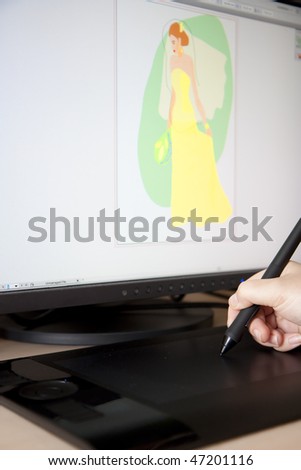 Graphic designer drawing a sketch using tablet