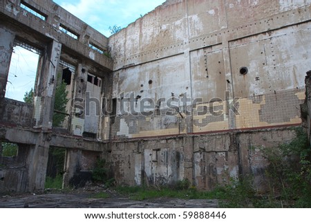 Abandoned factory - concrete ruins in industrial district