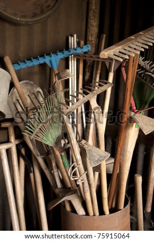Tools in dark shed on a farm