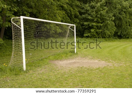 Football ground with goal gates