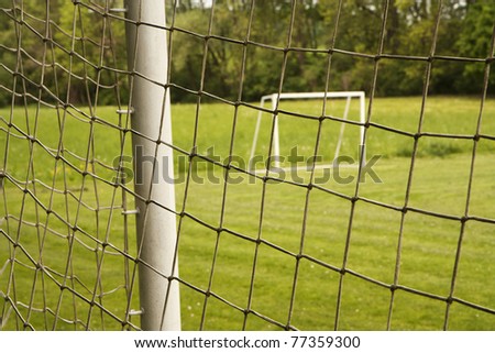 Football ground with goal gates