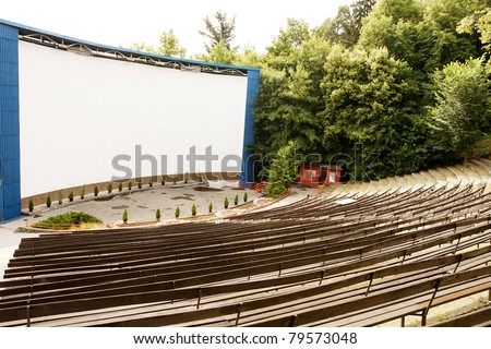Outdoor cinema stage and empty seats