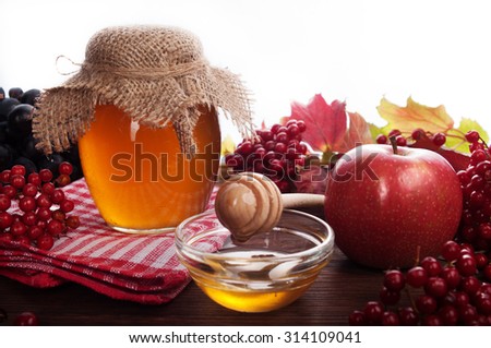 Honey; Apple; Spoon with honey; Useful food; traditional recipes; Cover for a cookbook; recipes; health benefits; organic food; Herbal honey flower honey;