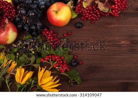 Apples; grapes; flowers; The substrate for the fall menu; the substrate for the menu bars and restaurants; Cover cookbook; wood background; autumn; still life; warm colors