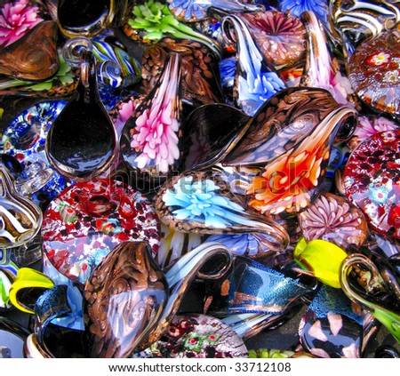 Pile of glass floral and metallic painted trinkets