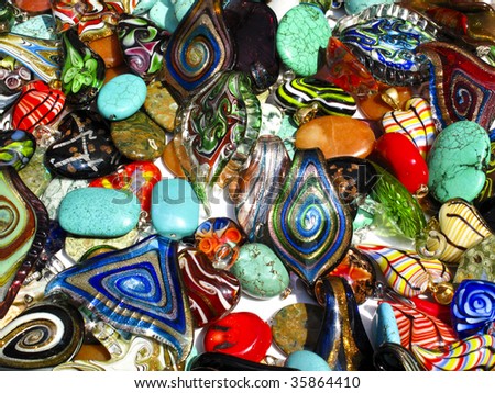 Pile of glass floral and metallic painted trinkets