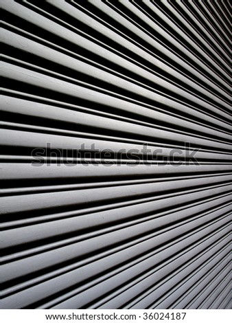 Abstract metal background - side view of a metal gate