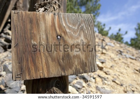 Old mining shaft wood sign