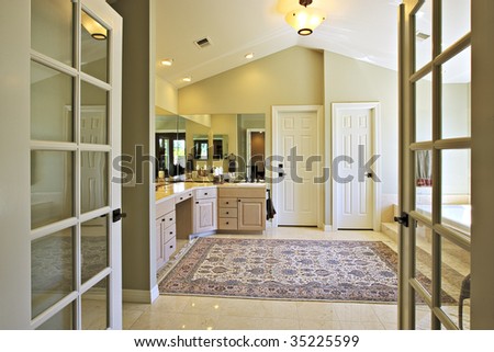 Luxury Bathroom as seen through French door entry
