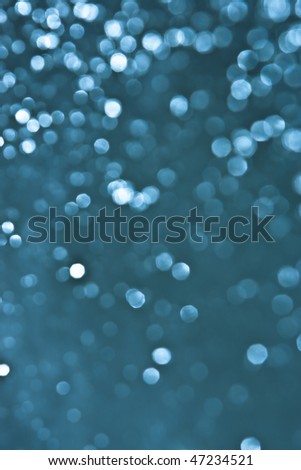Blue Defocused background. Smooth area in lower area for copy space.