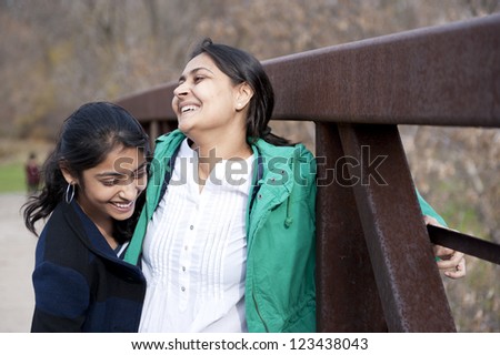 Indian loving mother and daughter in outdoors