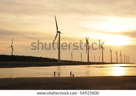 gold sunset at the wind-power station